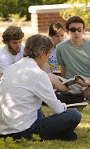 lc web Learning community students studying on the green