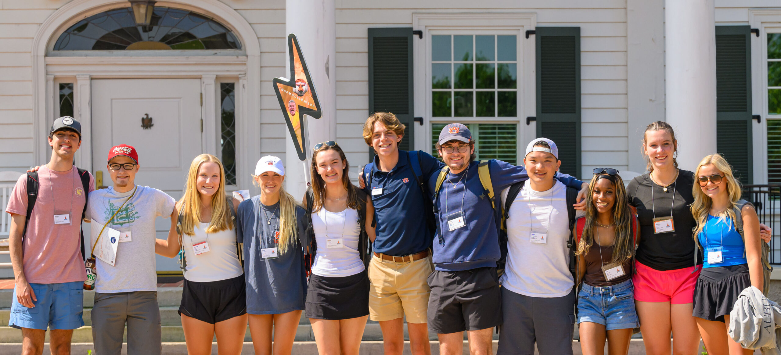 Group of freshmen and their CWE counselor smiling.