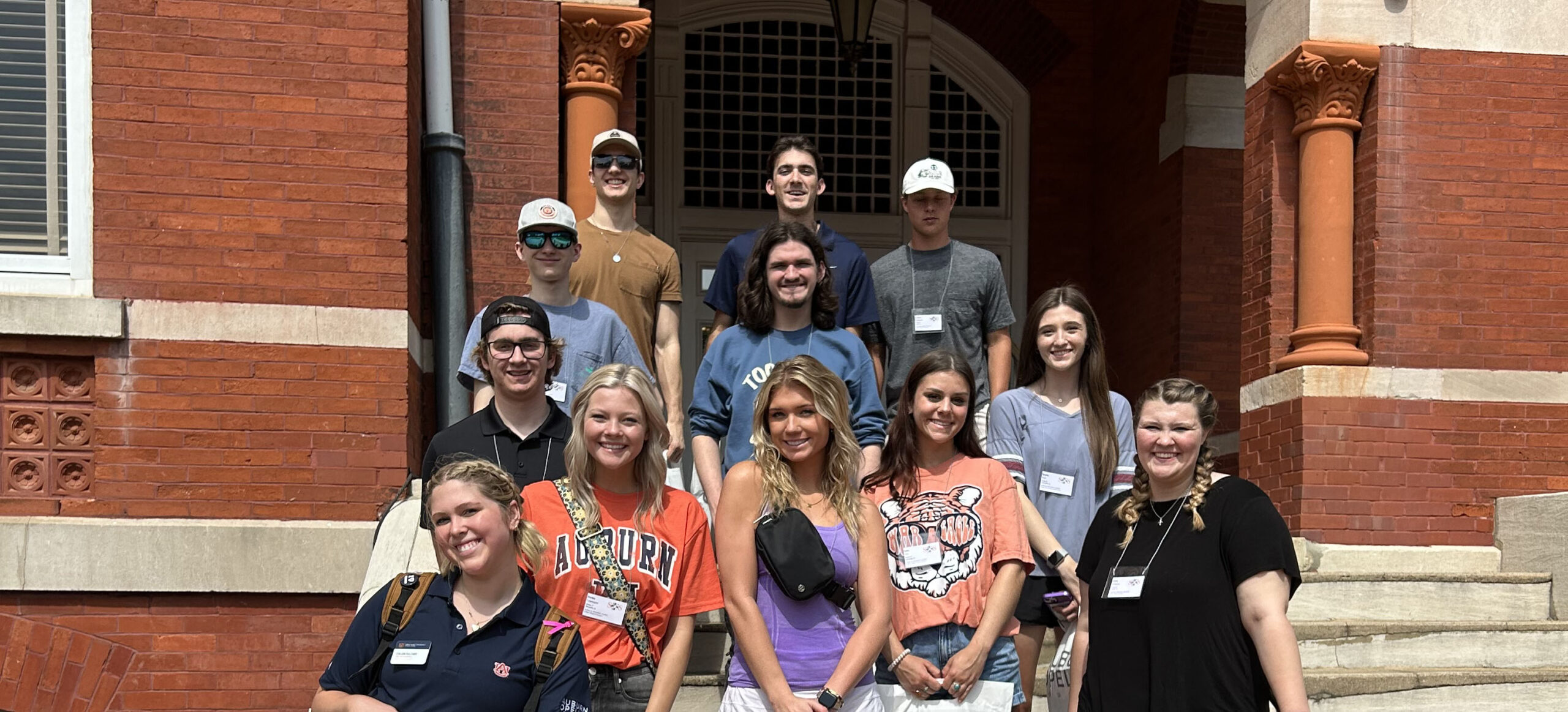 Group of students at SOS with their Counselor in front of Samford Hall